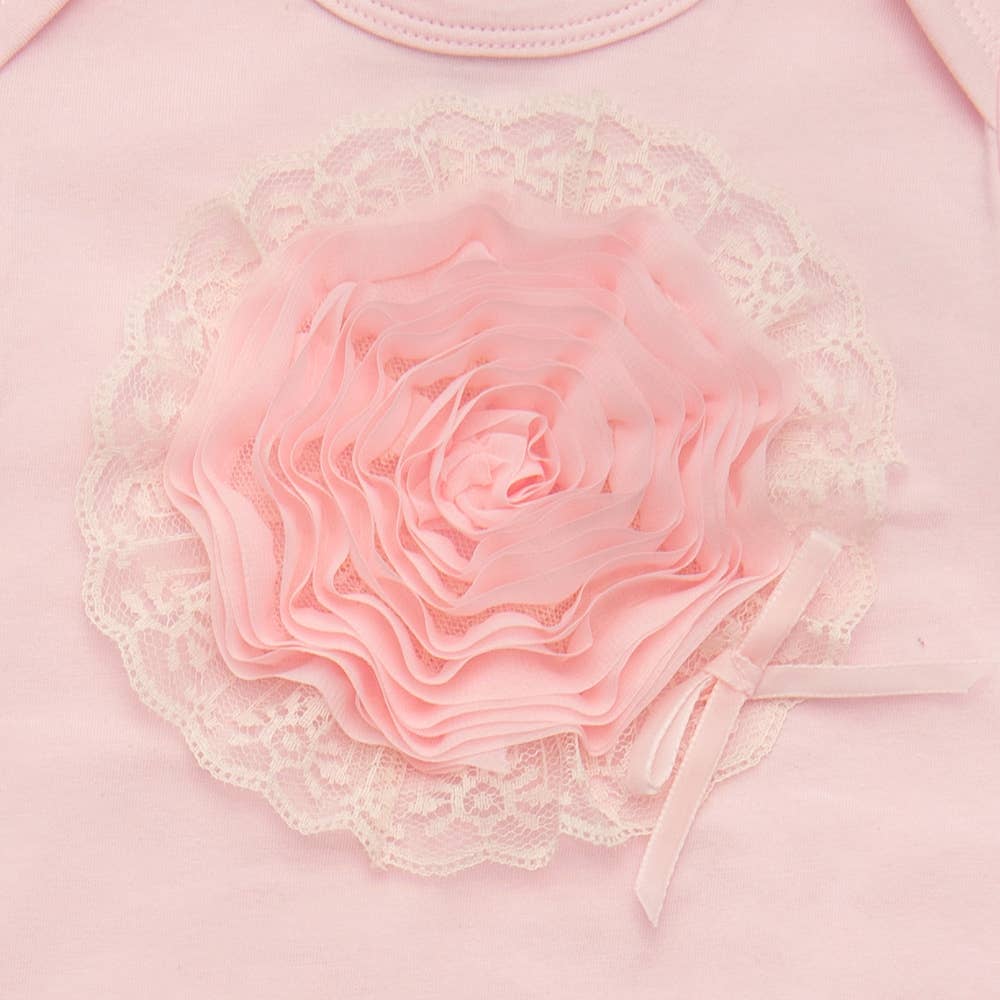 Vestido de bebé rosa con canción de cuna